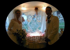 Two doves on a heart, delivered and set up with display/drip tray and up lighting.